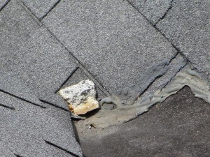 Piece of chimney in roof valley